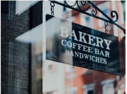 Sign outside a small bakery, coffee and sandwich bar