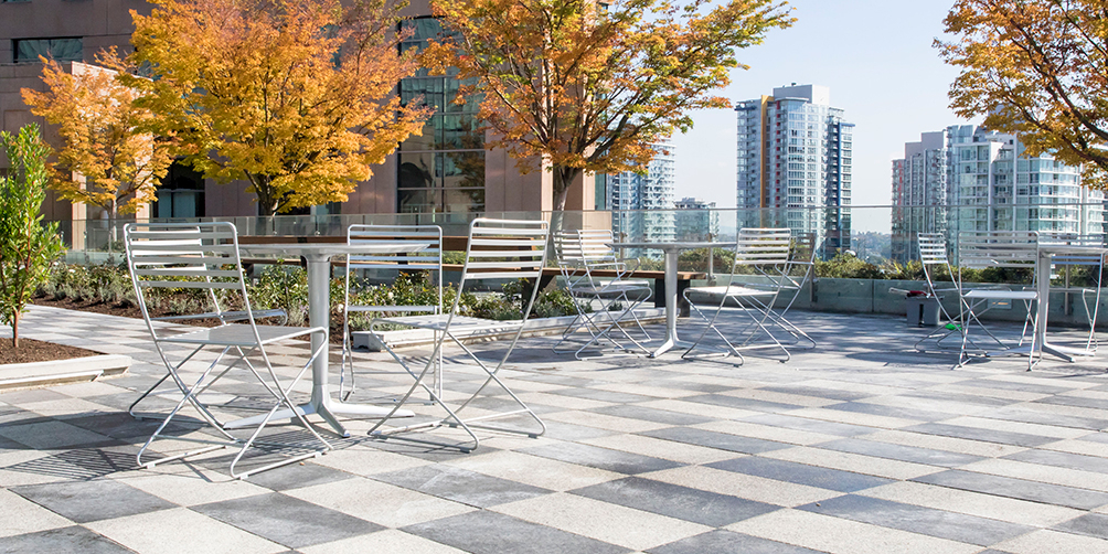 Photo from rooftop garden looking north-east showing tables and chairs