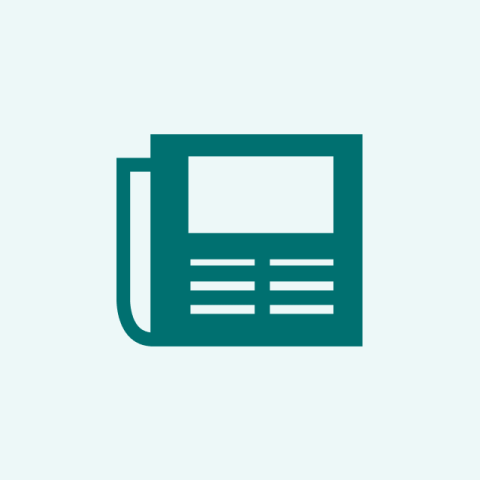 A stylized image of a dark green newspaper folded in half in front of a light green background.